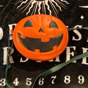 used love pain and stitches pumpkin cross body